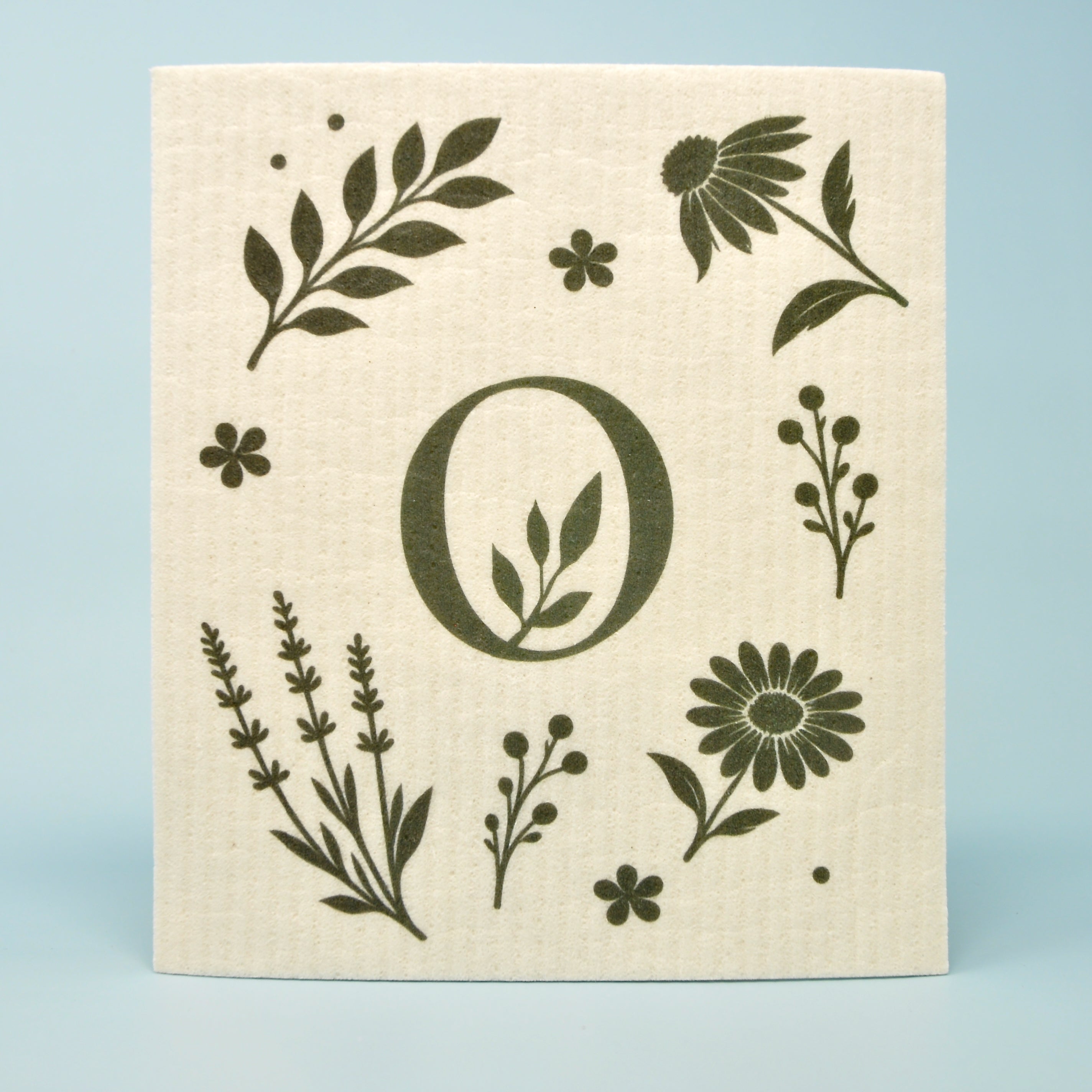 Natural coloured reusable Eco Cloth with botanical print, designed to replace disposable paper towels in the kitchen.