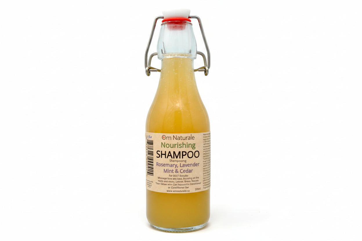 Nourishing Shampoo with Botanical Infusions by Om Naturale – soap-free plant-based cleanser in refillable glass bottle, infused with Omgrown herbal tea, plant keratin, Vitamin B, silk and oat protein, and lavender, rosemary, cedarwood, peppermint essential oils, farmcrafted in BC Canada.