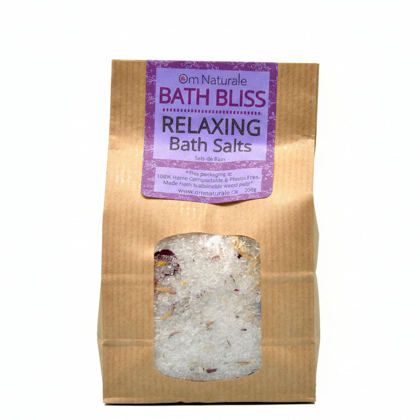 Om Naturale Bath Bliss, natural Epsom salt and wildcrafted botanicals with rose geranium, ylang ylang, cinnamon and vanilla essential oils for a soothing bath experience