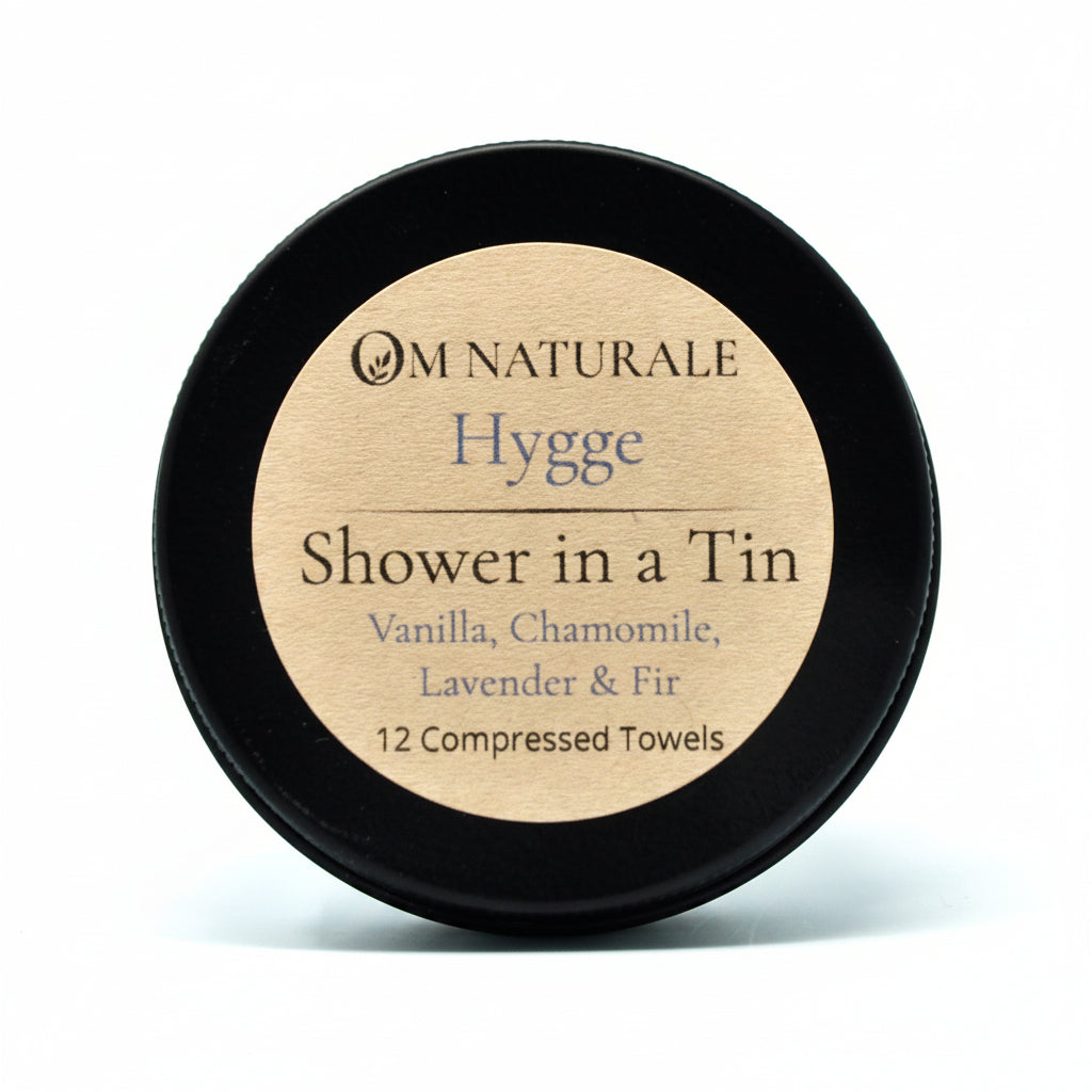 Om Naturale Hygge Shower in a Tin with compressed travel towels.
