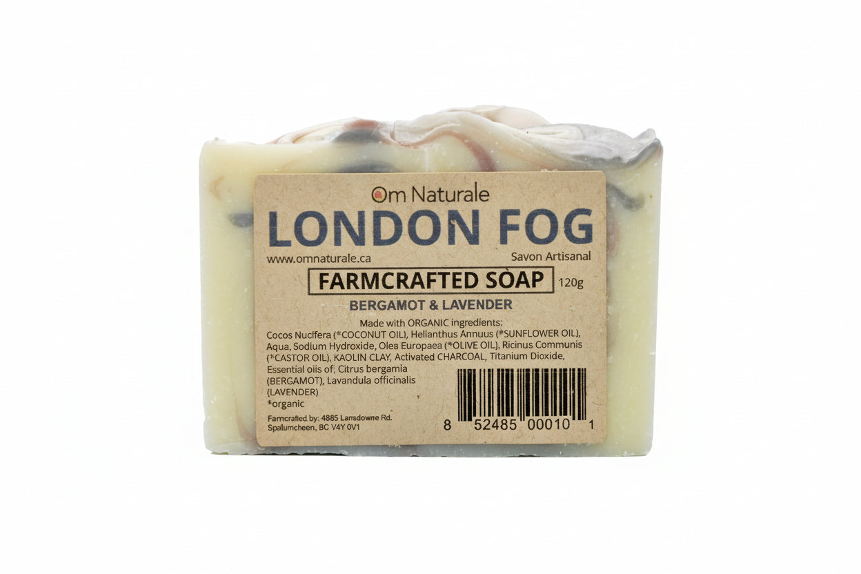 Close-up of Om Naturale London Fog Farmcrafted Soap showing natural texture and clay swirls, bergamot and lavender essential oil soap from BC