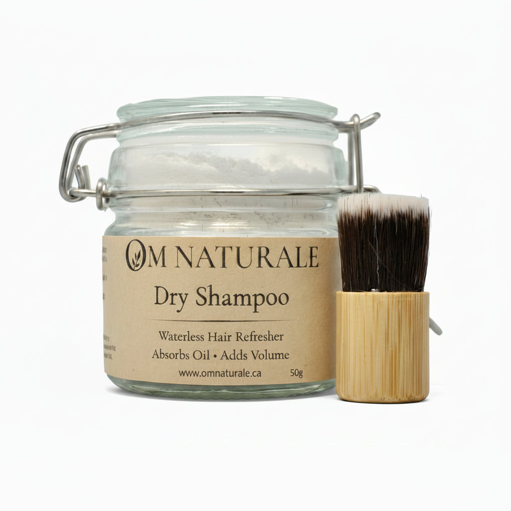 Om Naturale Natural Dry Shampoo with a soft bristle applicator brush for targeted application.