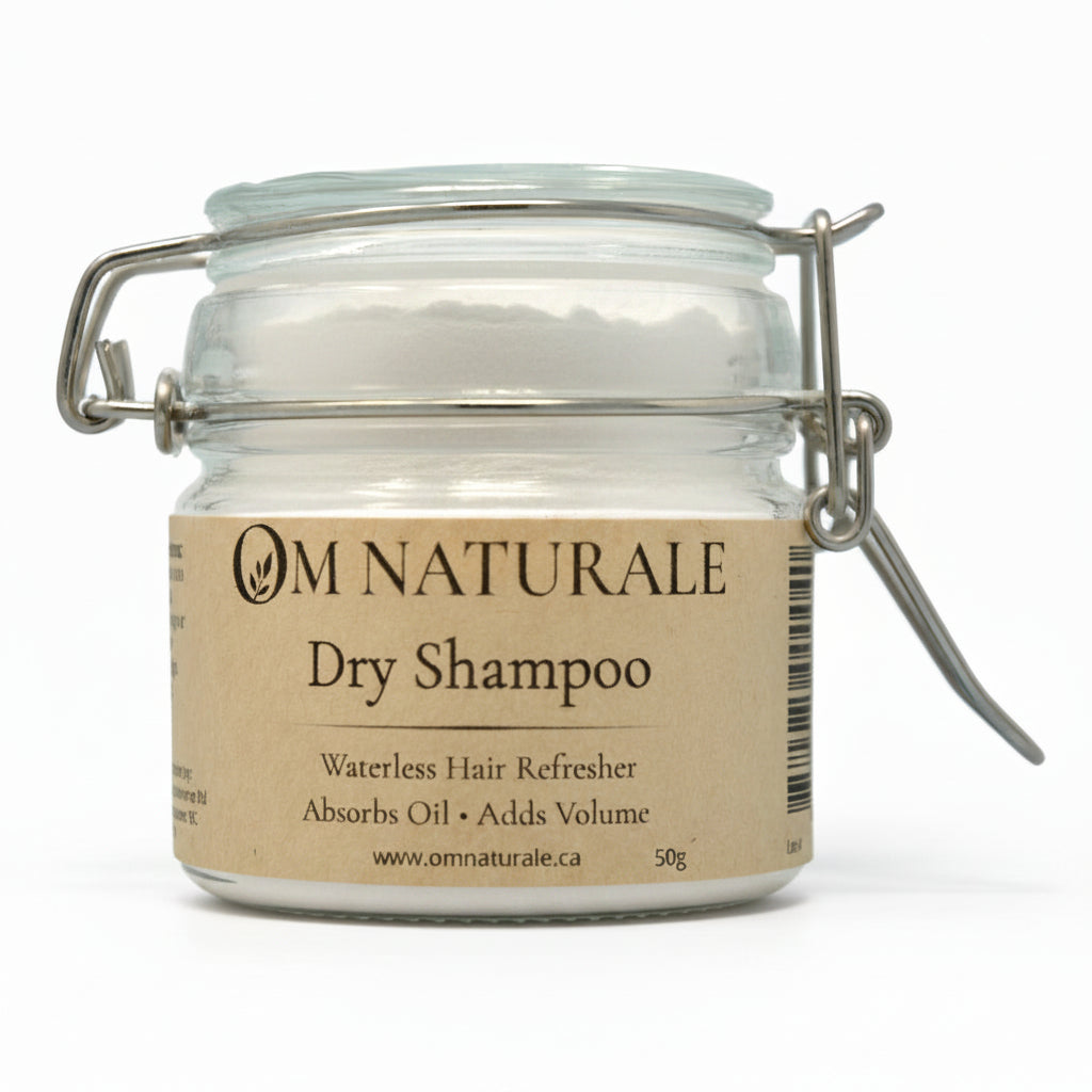 Om Naturale Natural Dry Shampoo in a recyclable and/or refillable flip top glass jar.