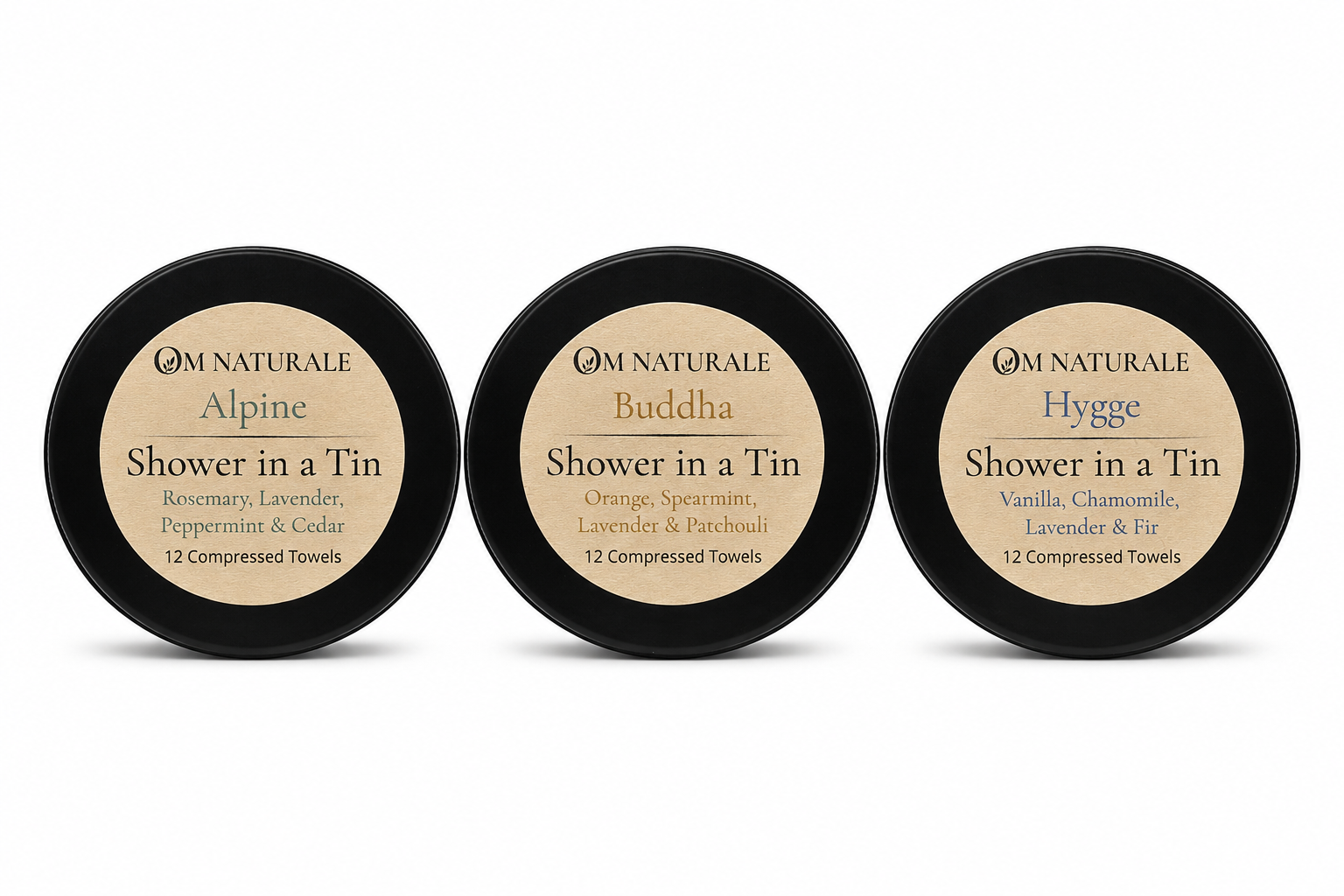 Om Naturale Shower in a Tin collection featuring Alpine, Buddha and Hygge compressed travel towels.
