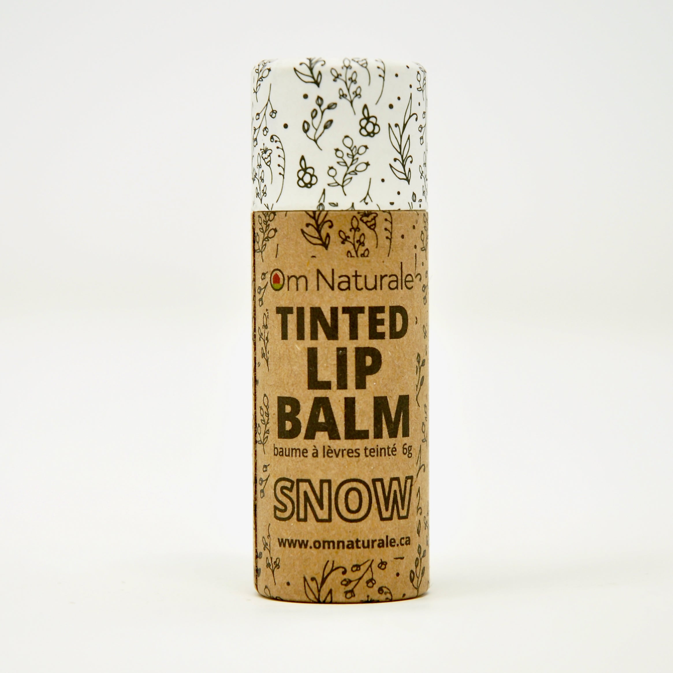 Om Naturale Snow tinted lip balm clear white – sheer shine and protection, natural zinc-based in home compostable tube