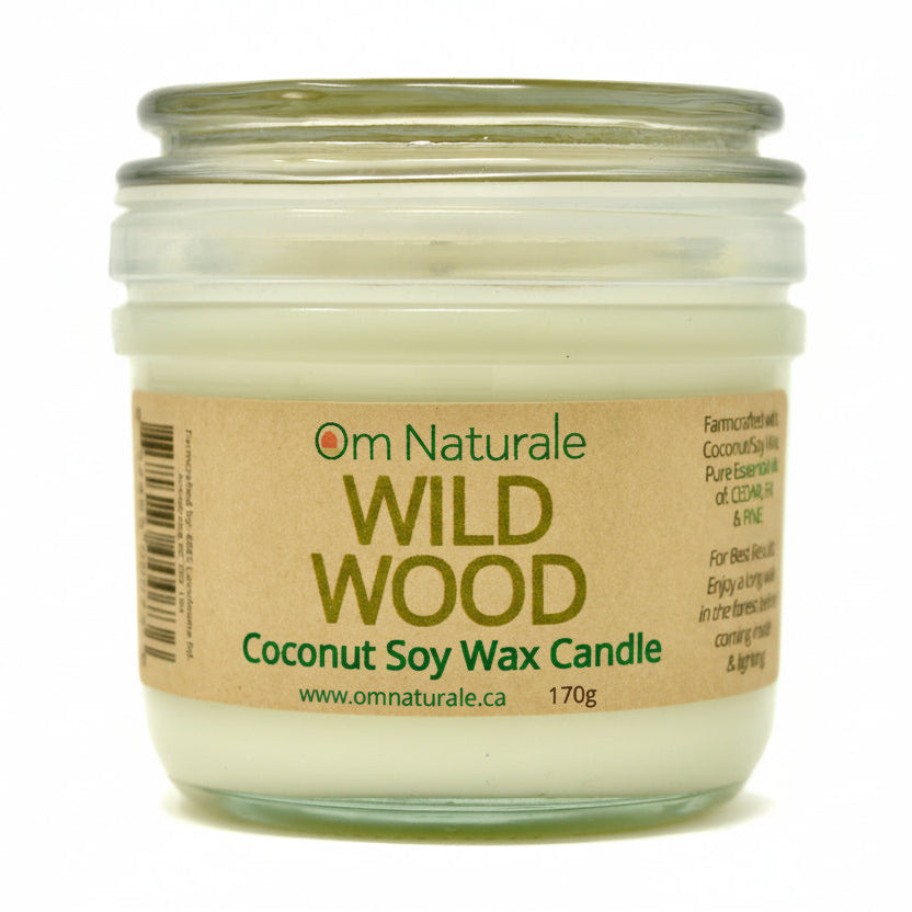 Om Naturale Wild Wood Coconut Wax Candle in a glass jar, natural plant-based candle with cedarwood, fir and pine essential oils for cozy home aroma