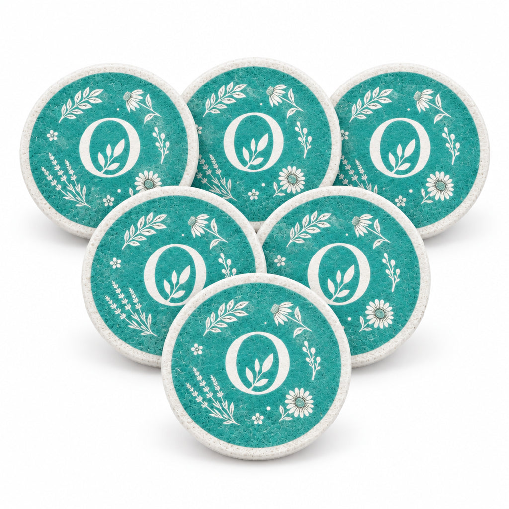 Om Naturale Teal Round Eco Sponge made from natural wood pulp cellulose for gentle reusable facial cleansing.