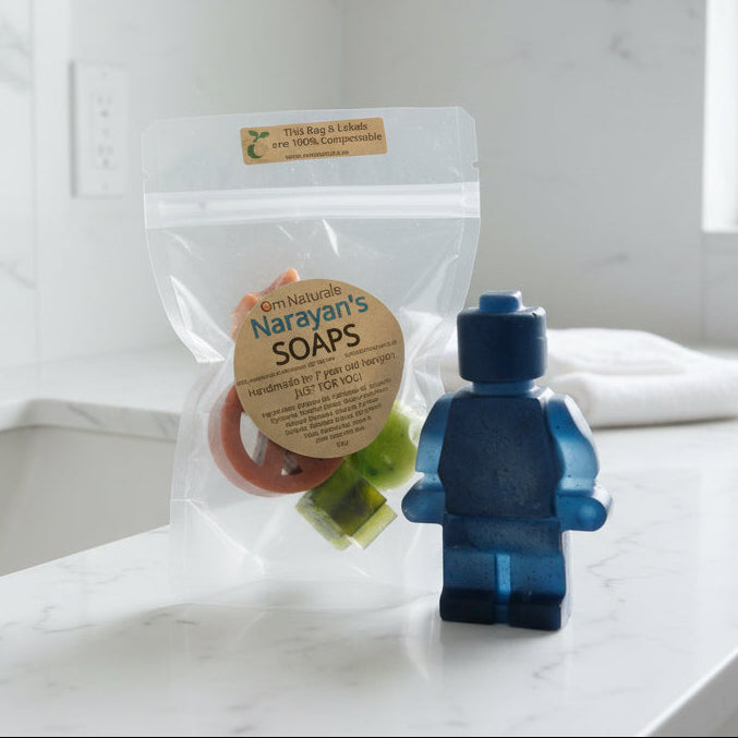 Narayan & Bodhi’s Lil Soaps styled in natural bathroom setting, showcasing Canadian handmade small-batch soap for self-care