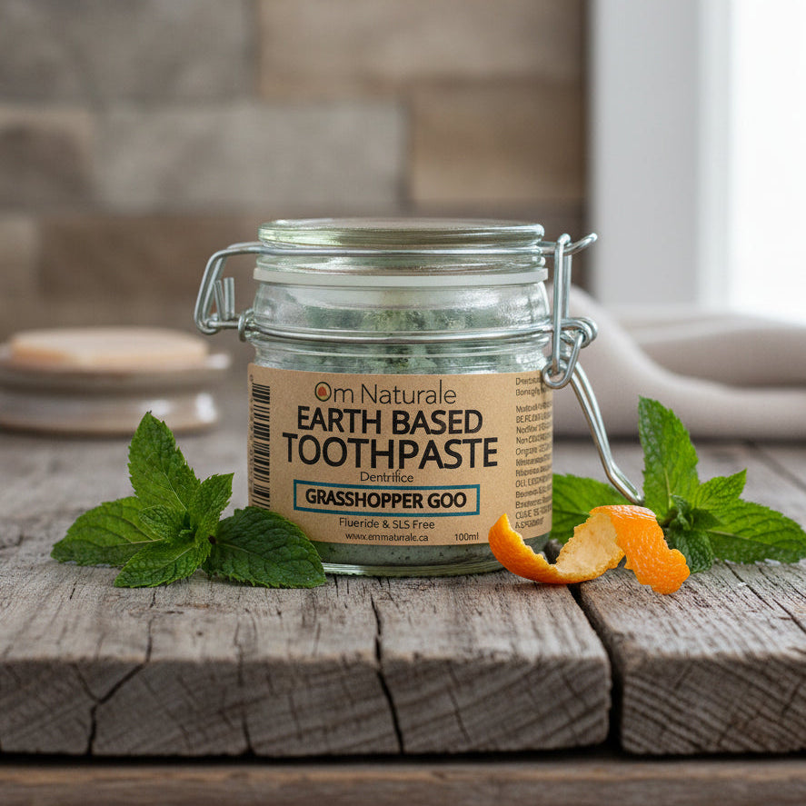 Grasshopper Goo natural toothpaste with calendula flowers – fluoride-free SLS-free glycerin-free formula, chlorophyll-infused with organic coconut oil and xylitol, whimsical herbal care handmade by Om Naturale BC.
