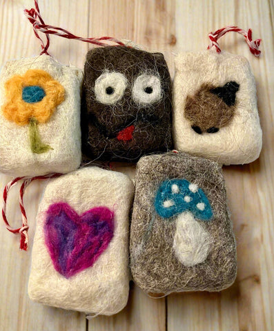 Handmade vegan needle-felted wool soap ornaments with flower, heart, owl, and mushroom designs, crafted in Okanagan, BC