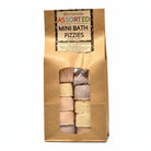 Om Naturale Assorted Mini Bath Fizzies 12‑pack with Rose, Lavender and Surprise varieties, natural bath fizzies with Epsom salts, botanicals and essential oils for a relaxing tub experience