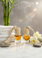 Pair of Om Naturale Buddha Car Diffusers, natural essential oil air fresheners with spearmint, patchouli, lavender and orange for refreshing vehicle fragrance