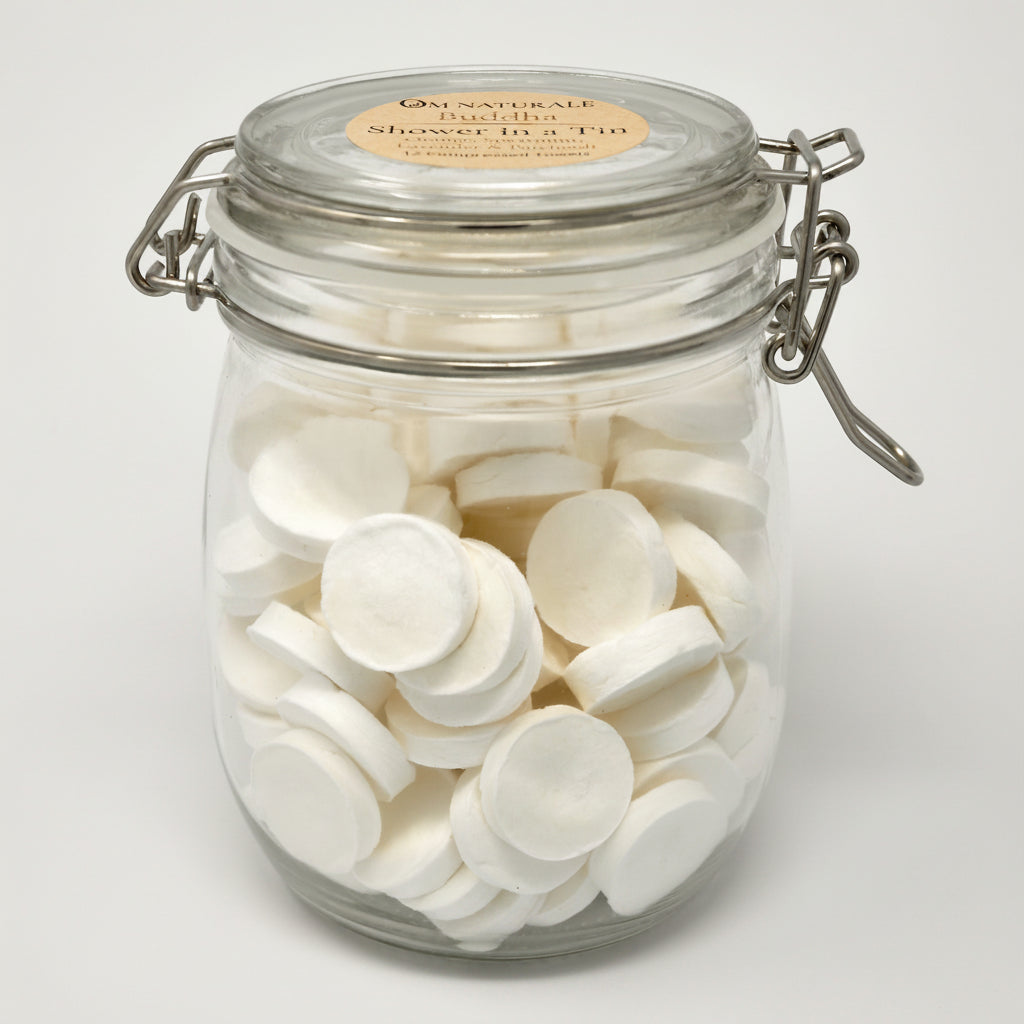 Om Naturale Buddha retail refill jar containing 120 compressed towels.