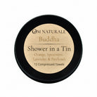Om Naturale Buddha Shower in a Tin with compressed travel towels.
