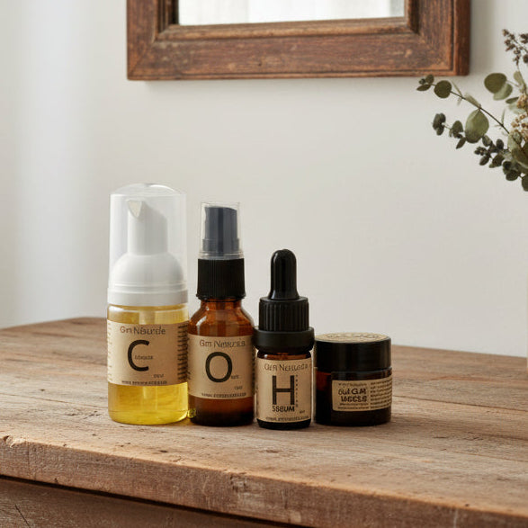 COH travel size skincare collection by Om Naturale displayed as a complete natural skincare routine with cleanser, toner, serum and clay masque