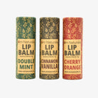 Om Naturale Compostable Lip Balm 3‑Pack, set of natural lip balms in compostable tubes — Cinnamon Vanilla, Double Mint, and Cherry Orange flavours