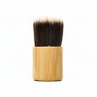 Soft bristle applicator brush used to add Om Naturale Natural Dry Shampoo to hair and scalp for daily hair maintenance.