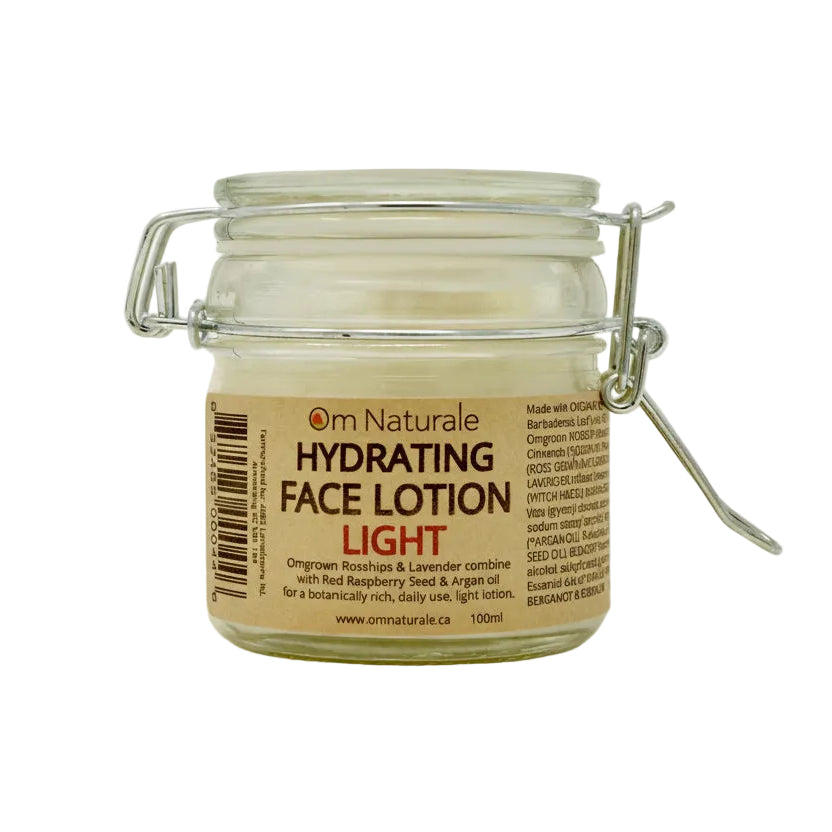 Om Naturale Hydrating Face Lotion Light in jar on white background, Canadian made natural light face moisturizer with rose hips, argan and raspberry seed oils