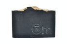 Om Naturale Hygge Farmcrafted Soap on white background, Canadian made natural soap with activated charcoal, vanilla, lavender and chamomile