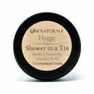 Om Naturale Hygge Shower in a Tin with compressed travel towels.
