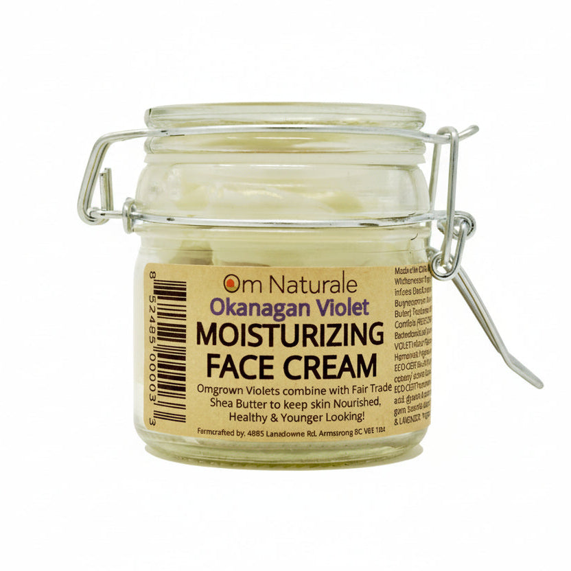 Om Naturale Moisturizing Cream in jar on white background, Canadian made natural face cream with wildcrafted violets, shea and cocoa butter