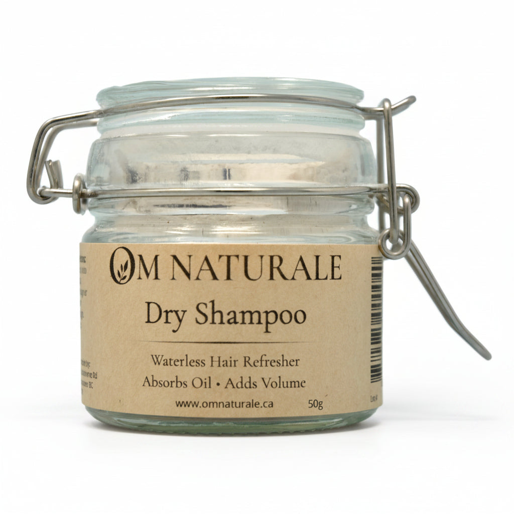 Om Naturale Natural Dry Shampoo in a recyclable and/or refillable flip top glass jar.