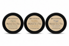 Om Naturale Shower in a Tin collection featuring Alpine, Buddha and Hygge compressed travel towels.