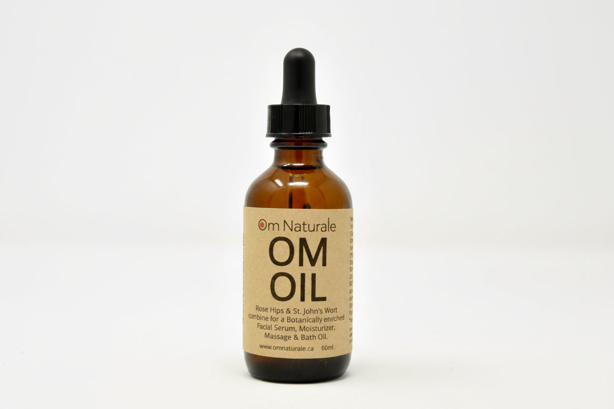 Om Oil with Wild Rose Hip & St. John's Wort by Om Naturale – multi-purpose botanical oil infused with Omgrown rose hips and St. John's wort, blended with geranium patchouli ylang ylang vanilla essential oils and vitamin E, in glass bottle for massage face bath use, farmcrafted in BC Canada 50ml.