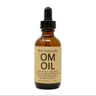 Om Oil with Wild Rose Hip & St. John's Wort by Om Naturale – multi-purpose botanical oil infused with Omgrown rose hips and St. John's wort, blended with geranium patchouli ylang ylang vanilla essential oils and vitamin E, in glass bottle for massage face bath use, farmcrafted in BC Canada 50ml.