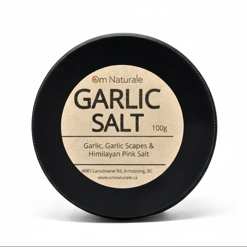 Omstead Garlic Salt by Om Naturale – small-batch blend of dehydrated Omgrown garlic, garlic scapes, and Himalayan pink salt for bold fresh garlic flavor, perfect all-purpose seasoning farmcrafted in Armstrong BC Canada.