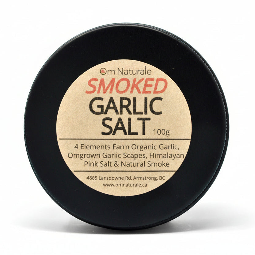 Omstead Smoked Garlic Salt by Om Naturale – small-batch naturally smoked with Omgrown garlic, garlic scapes, and Himalayan pink salt for rich smoky flavor, perfect for chilis, stews, rubs, popcorn, farmcrafted in Armstrong BC Canada.