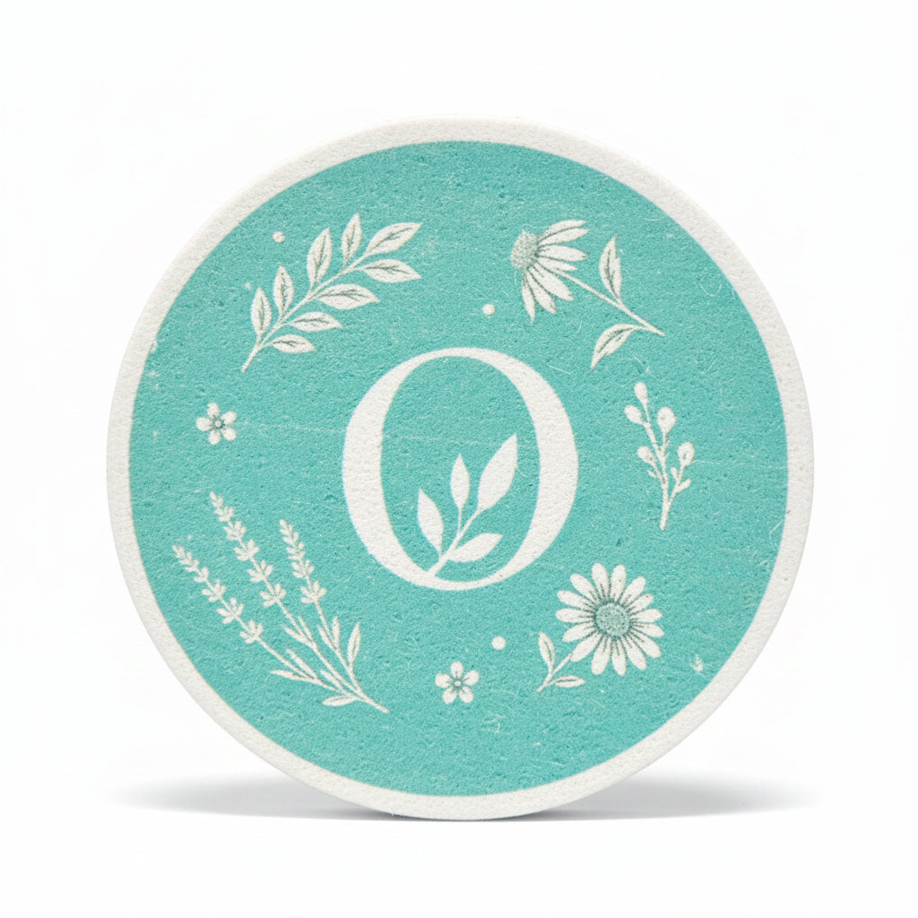 Om Naturale Teal Round Eco Sponge made from natural wood pulp cellulose for gentle reusable facial cleansing.