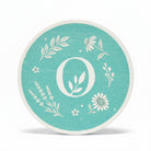 Om Naturale Teal Round Eco Sponge made from natural wood pulp cellulose for gentle reusable facial cleansing.