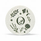 Reusable Round Eco Sponge with botanical design made from home compostable cellulose.
