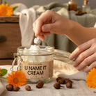 U Name It Zinc Cream displayed with wildharvested calendula and poplar – organic shea and zinc oxide multi-purpose cream, gentle nourishing texture with lavender chamomile vanilla, from Om Naturale farm.